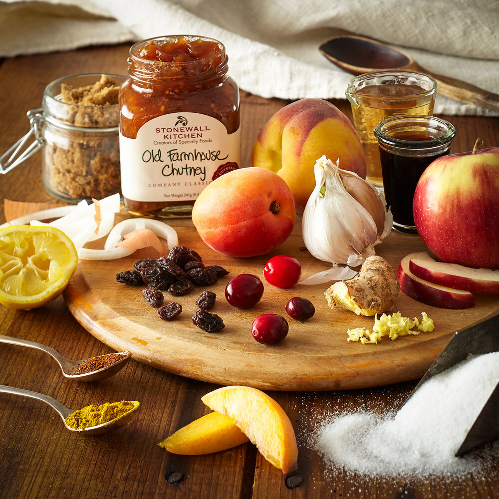 Old Farmhouse Chutney on cutting board with fruit